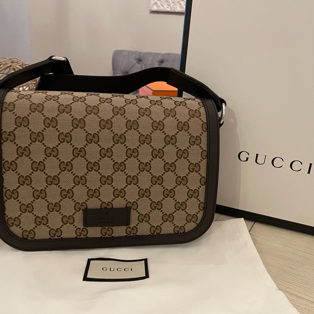 Gucci GG canvas messenger bag. Unisex. New with box and dust bag.
